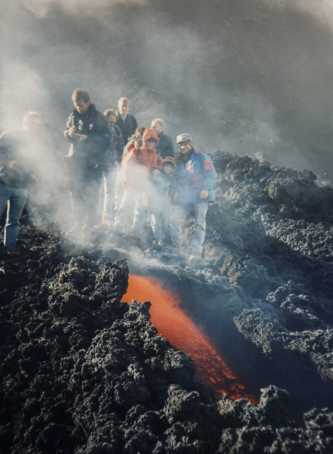 Marco's (in orange jacket) first lava flow, with his little brother Alessandro and his father Alfio.
Etna, October 1999