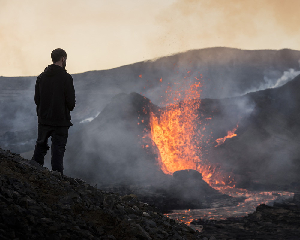 Marco Di Marco, photojournalist, watches lava fountains produced by fissure #5 during the 2021 Fagrdalsfjall eruption, April 27th, 2021
Photo by: Kerstin Langenberger
